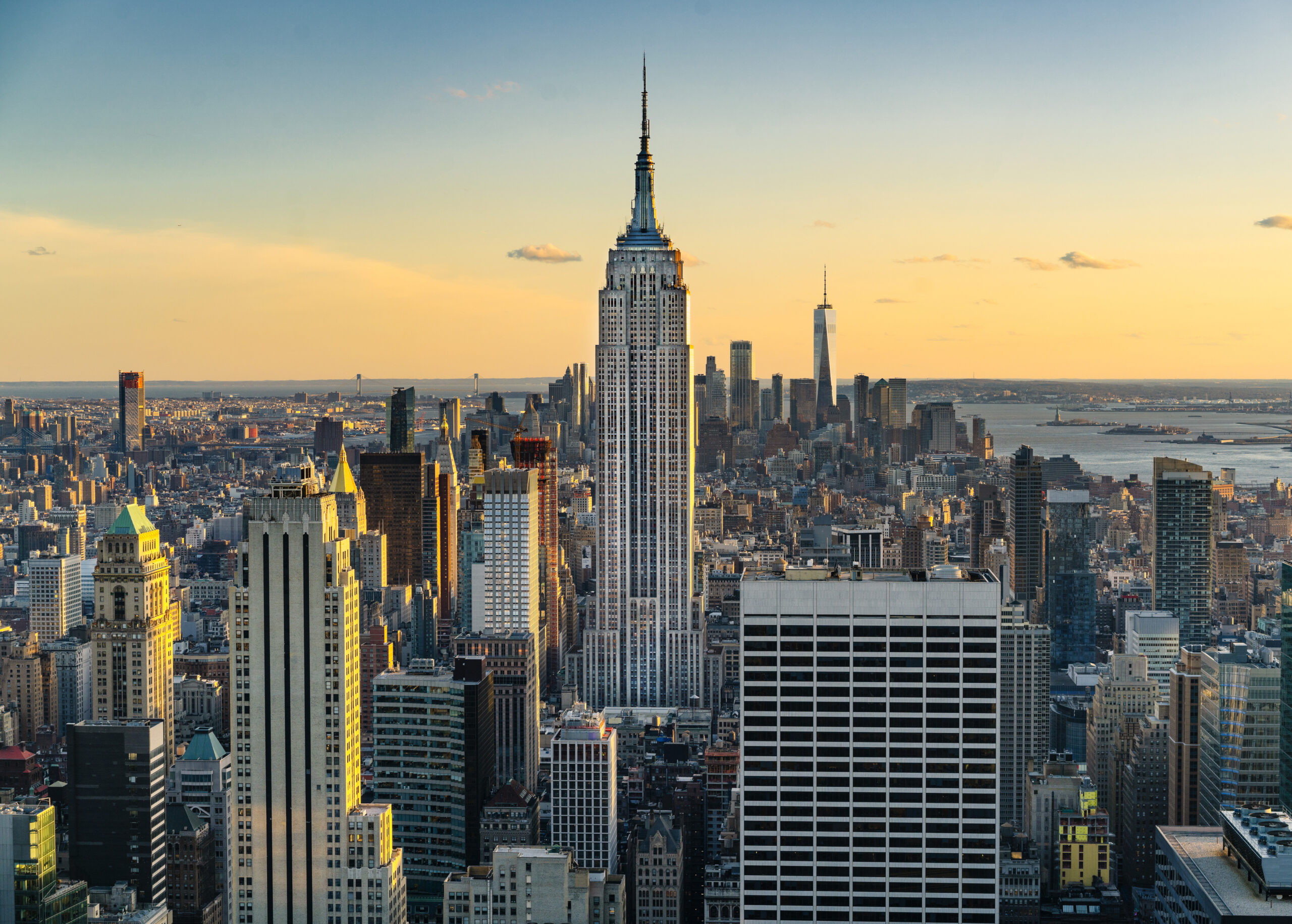 An expansive view of the New York skyline at sunset